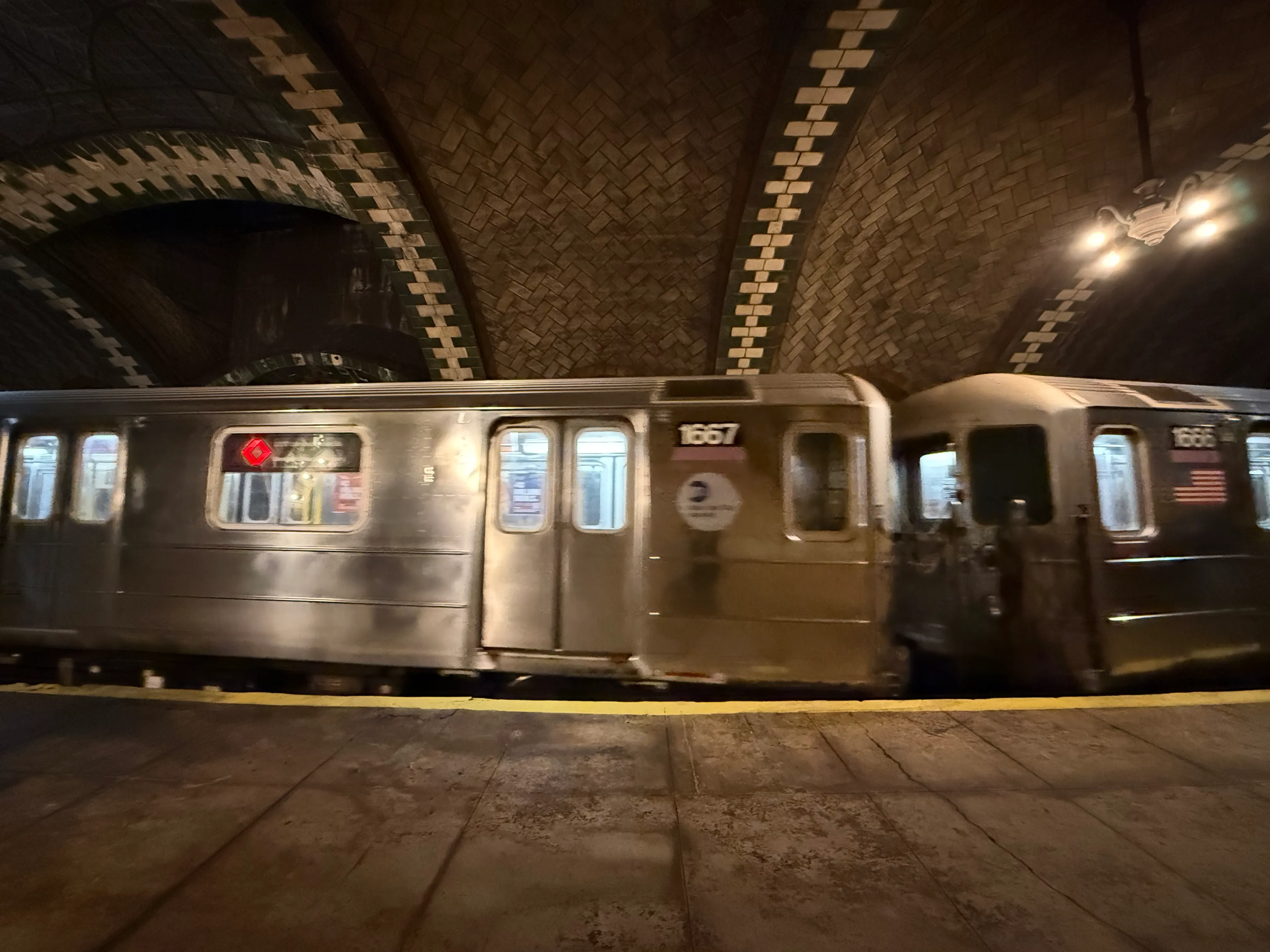 The 6 train going through the station. It just barely fits and has a 3ft+ gap between the train and the platform at certain points.